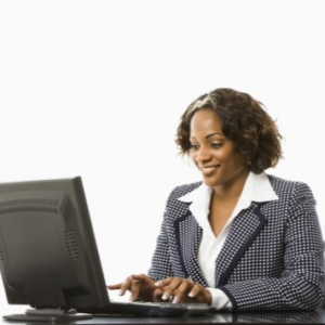 Woman smiling looking into the laptop
